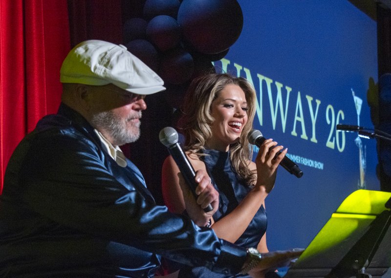 Drexel Davison, owner of Bad Hair Day, and Grace Eckerle, journalist and co-anchor at Coast TV, keep the show moving along.
